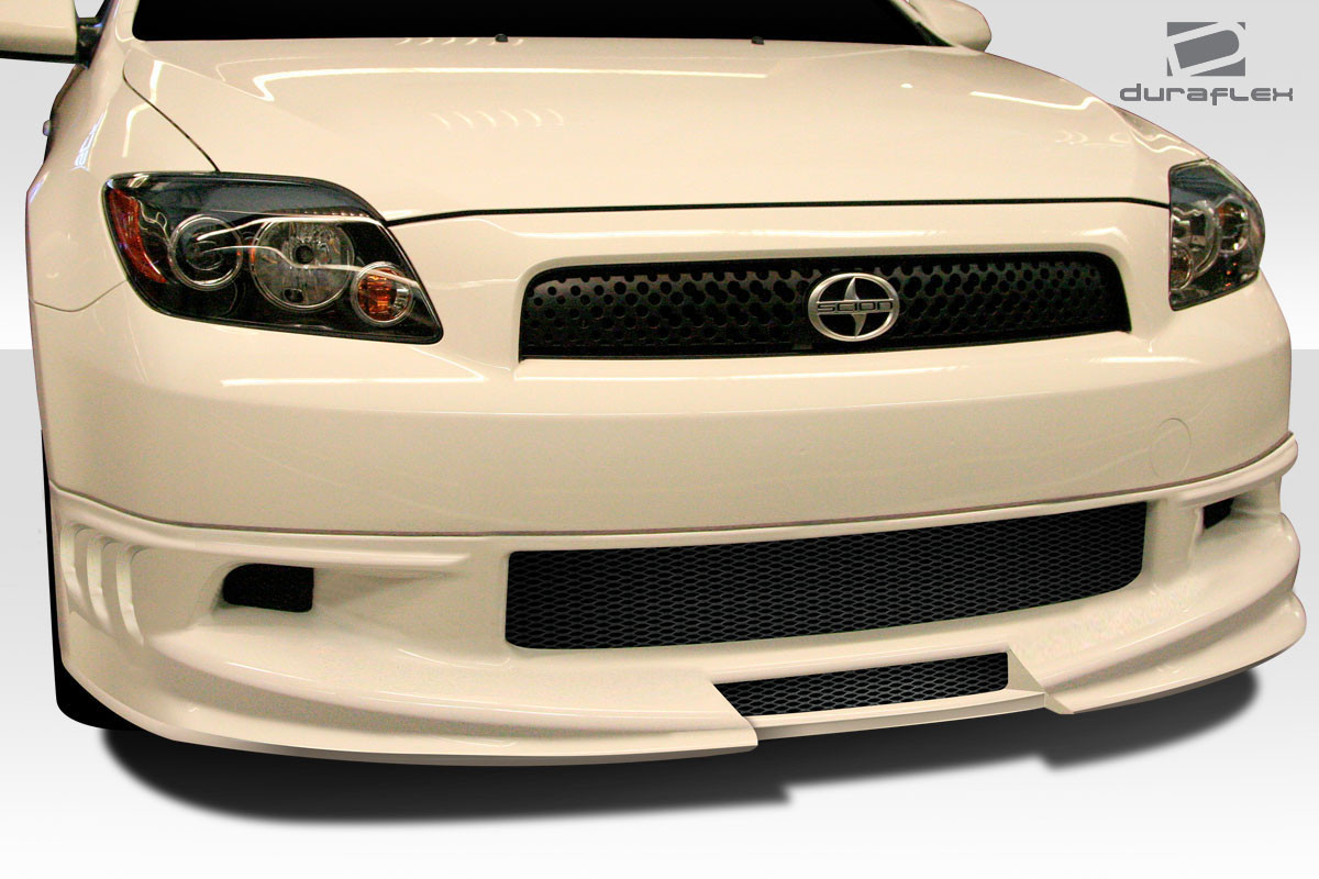 2005-2010 Scion tC Duraflex Racer Front Lip - 1 Piece / Vehicle Year Make Model Trim - 2005-2010-Scion TC ALL / Product Type - Front Lip/Add On / Style Name -Racer / Kit Material - FRP (Fiberglass Reinforced Plastics) / Notes -
