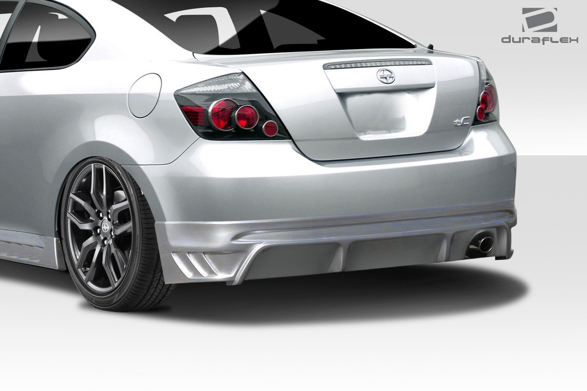 2005-2010 Scion tC Duraflex Racer Rear Lip - 1 Piece / Vehicle Year Make Model Trim - 2005-2010-Scion TC ALL / Product Type - Rear Lip/Add On / Style Name -Racer / Kit Material - FRP (Fiberglass Reinforced Plastics) / Notes -