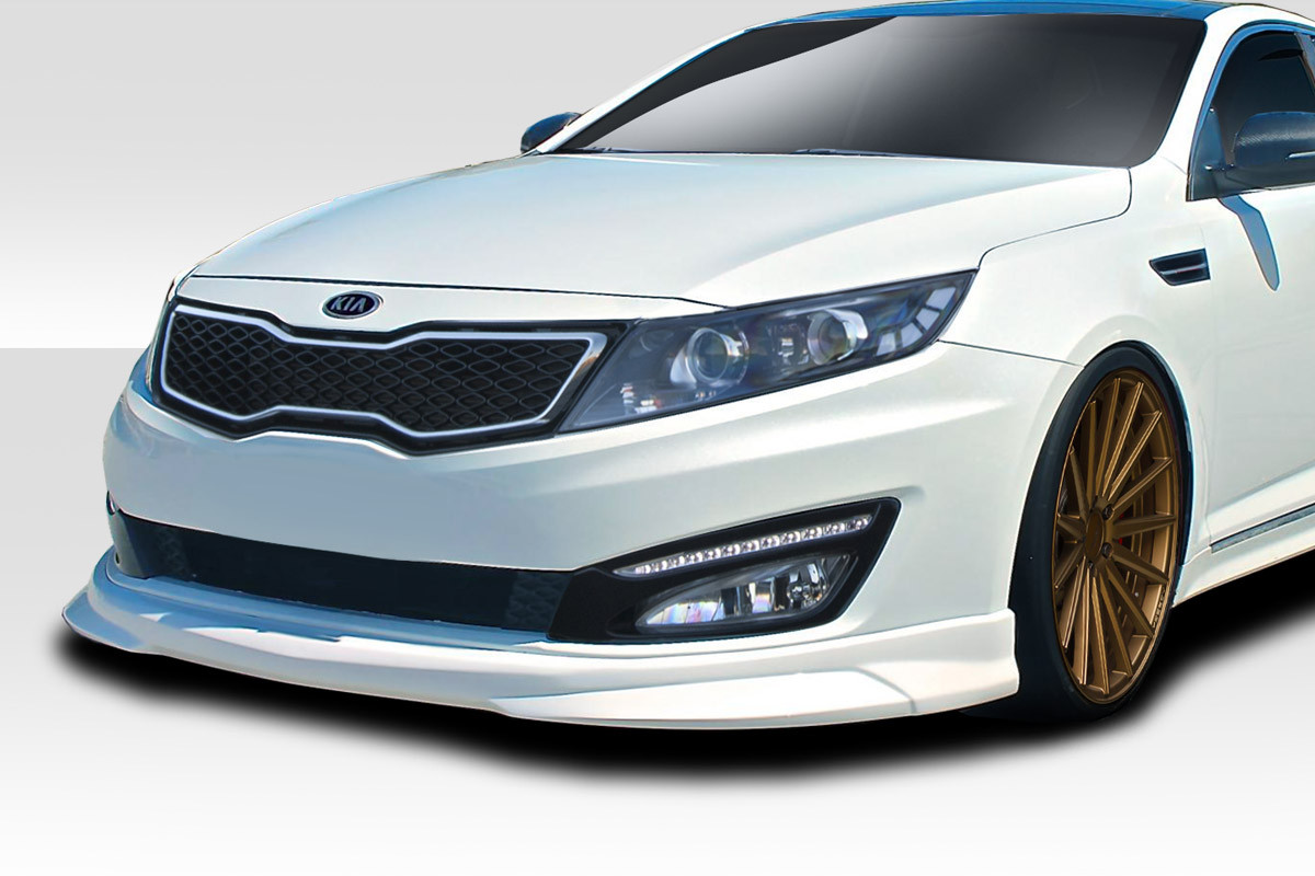 2010-2013 Kia Optima Duraflex N Design Front Lip - 1 Piece / Vehicle Year Make Model Trim - 2010-2013-Kia Optima ALL / Product Type - Front Lip/Add On / Style Name -N Design / Kit Material - FRP (Fiberglass Reinforced Plastics) / Notes -