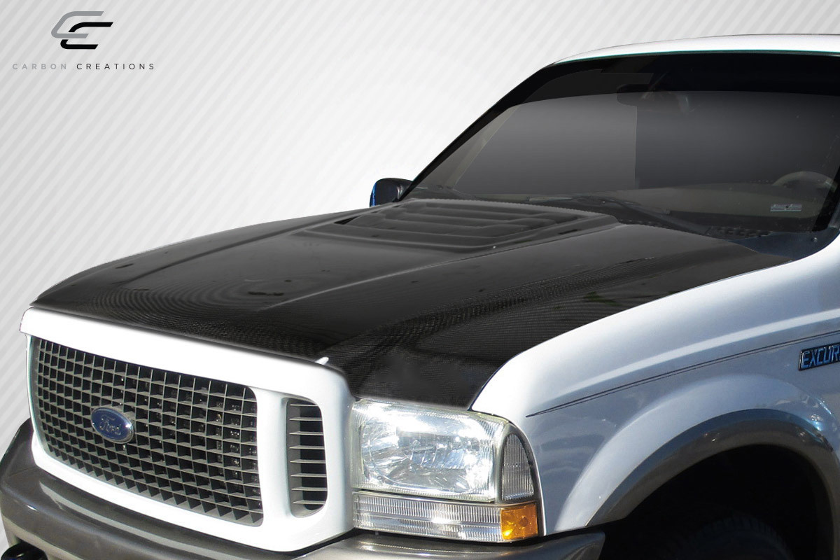 1999-2007 Ford Super Duty / 2000-2005 Ford Excursion Carbon Creations Raptor Look Hood - 1 Piece / Vehicle Year Make Model Trim - 1999-2007-Ford Super Duty ALL / Product Type - Hood / Style Name -Raptor Look / Kit Material - Carbon Fiber / Notes - Hood pins are required.