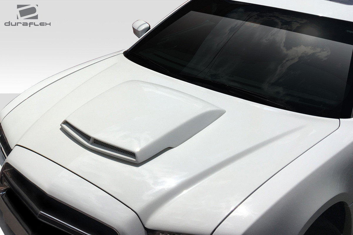 2011-2014 Dodge Charger Duraflex TA Look Hood - 1 Piece / Vehicle Year Make Model Trim - 2011-2014-Dodge Charger ALL / Product Type - Hood / Style Name -TA Look / Kit Material - FRP (Fiberglass Reinforced Plastics) / Notes - Hood pins are required.