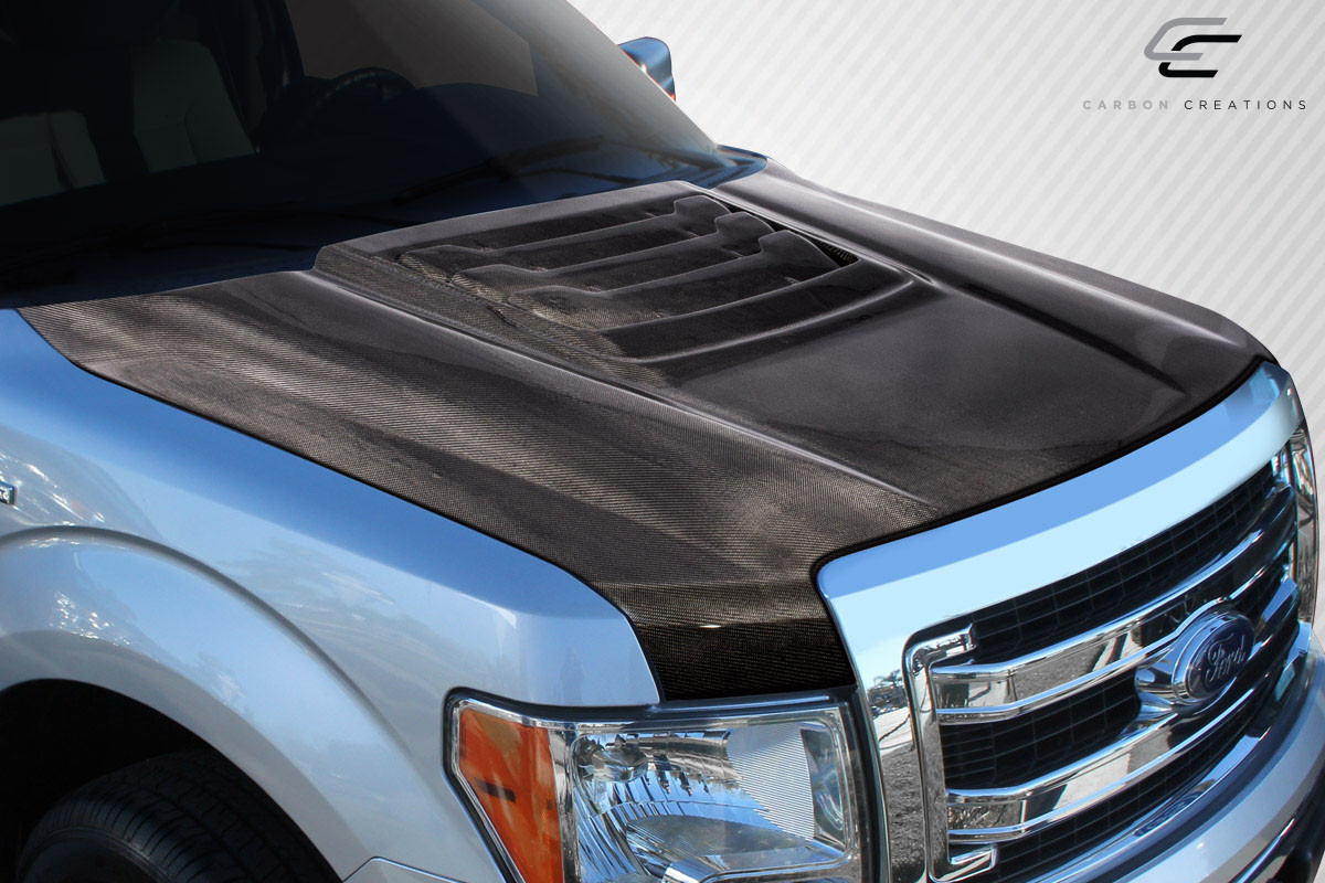 2009-2014 Ford F-150 Carbon Creations Raptor Look Hood - 1 Piece / Vehicle Year Make Model Trim - 2009-2014-Ford F150 ALL / Product Type - Hood / Style Name -Raptor Look / Kit Material - Carbon Fiber / Notes - Note: Hood pins are required.