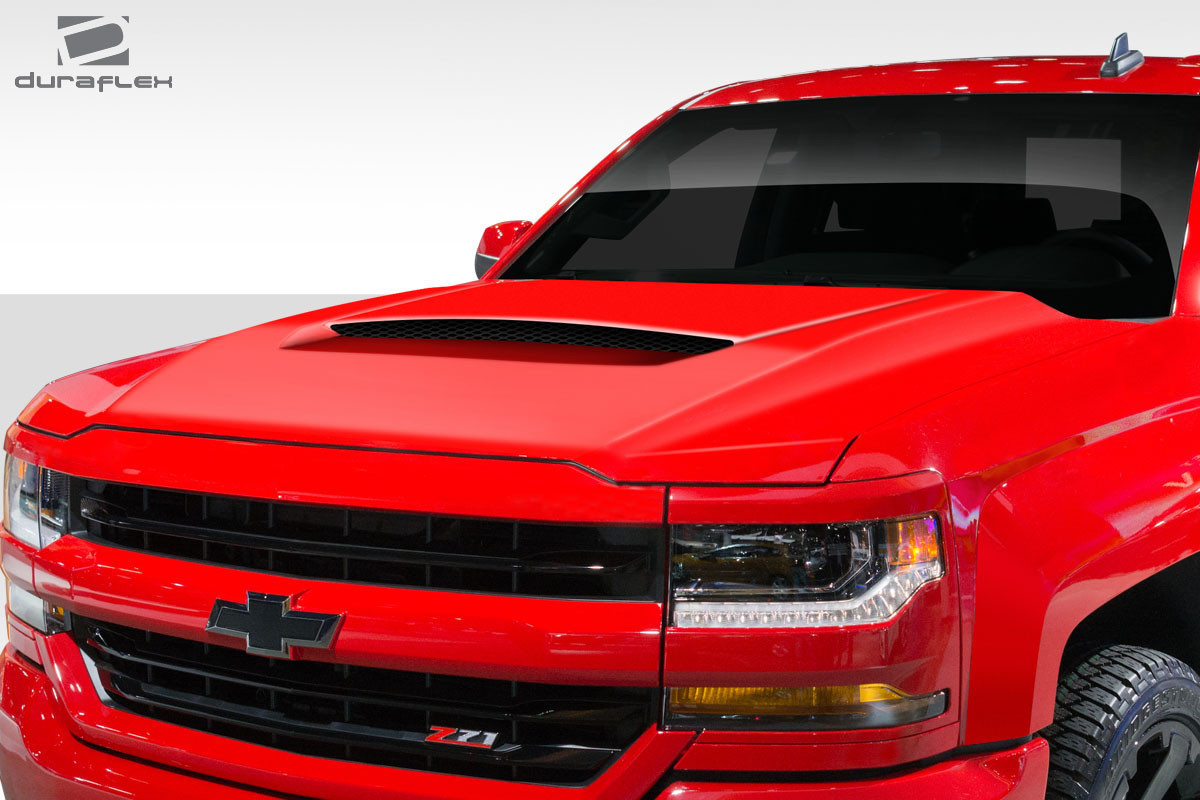 2016-2018 Chevrolet Silverado Duraflex GMX Hood - 1 Piece / Vehicle Year Make Model Trim - 2016-2018-Chevrolet Silverado ALL / Product Type - Hood / Style Name -GMX / Kit Material - FRP (Fiberglass Reinforced Plastics) / Notes - Note: Hood pins are required.