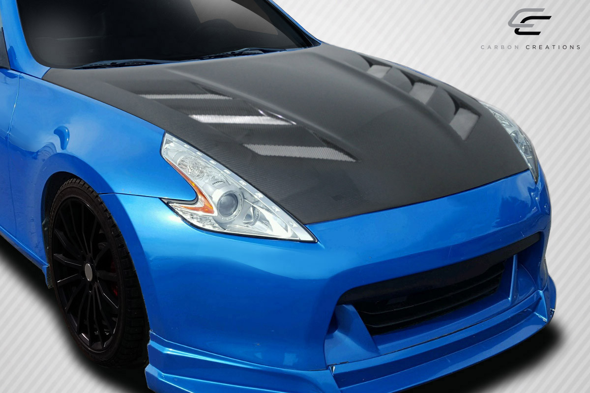 2009-2020 Nissan 370Z Z34 Carbon Creations AM-S Hood - 1 Piece / Vehicle Year Make Model Trim - 2009-2020-Nissan 370Z ALL / Product Type - Hood / Style Name -AM-S / Kit Material - Carbon Fiber / Notes - Note: Hood pins are required.
