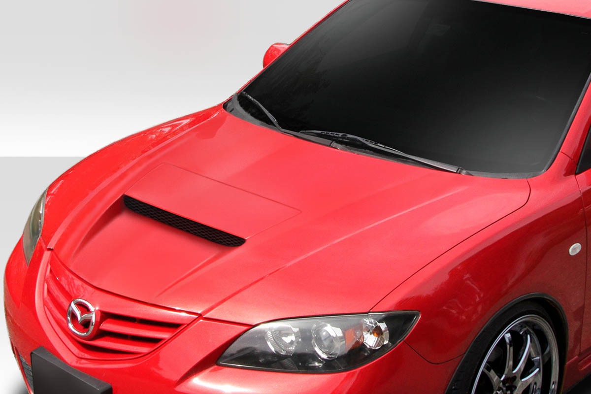 2004-2008 Mazda 3 4DR Duraflex M-Speed Hood - 1 Piece / Vehicle Year Make Model Trim - 2004-2008-Mazda Mazda 3 4DR / Product Type - Hood / Style Name -M-Speed / Kit Material - FRP (Fiberglass Reinforced Plastics) / Notes - Note: Hood pins are required.