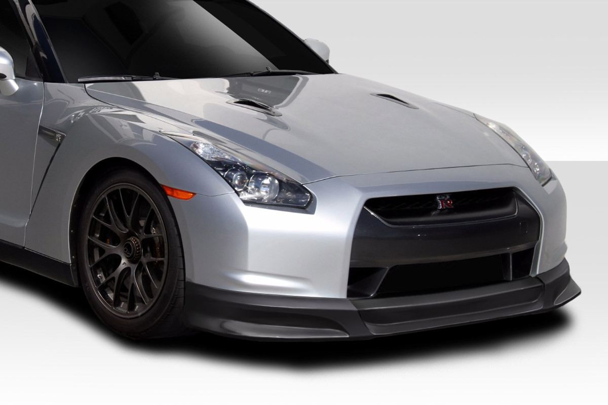 2009-2011 Nissan GT-R R35 Duraflex C1 Front Lip Under Spoiler Air Dam - 1 Piece / Vehicle Year Make Model Trim - 2009-2011-Nissan GTR ALL / Product Type - Front Lip/Add On / Style Name -C1 / Kit Material - FRP (Fiberglass Reinforced Plastics) / Notes -