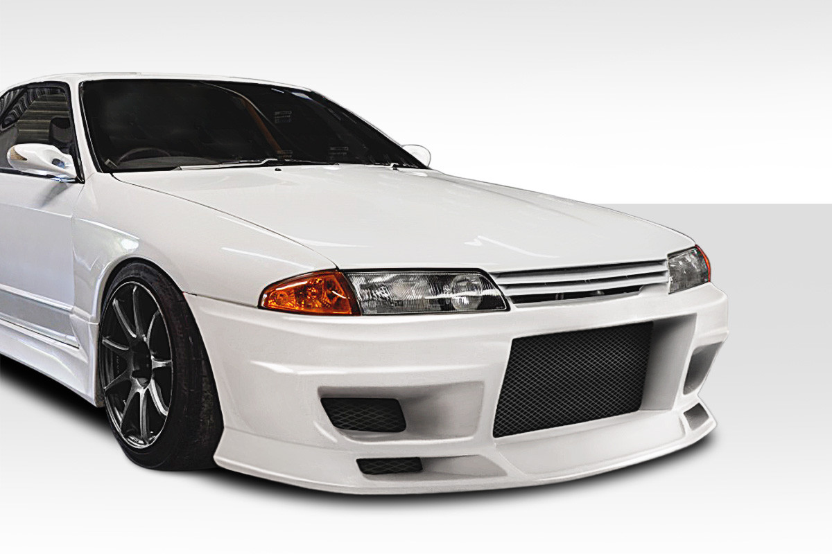 1989-1994 Nissan Skyline R32 2DR / 4DR Duraflex Demon V2 Front Bumper Cover - 1 Piece / Vehicle Year Make Model Trim - 1989-1994-Nissan Skyline 2DR / Product Type - Front Bumper / Style Name -Demon V2 / Kit Material - FRP (Fiberglass Reinforced Plastics) / Notes -