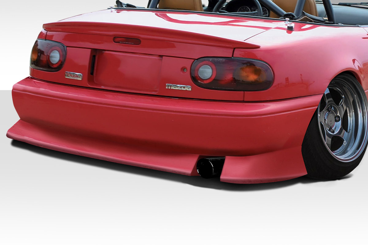 1990-1997 Mazda Miata Duraflex Demon Rear Bumper Cover - 1 Piece / Vehicle Year Make Model Trim - 1990-1997-Mazda Miata ALL / Product Type - Rear Bumper / Style Name -Demon / Kit Material - FRP (Fiberglass Reinforced Plastics) / Notes -