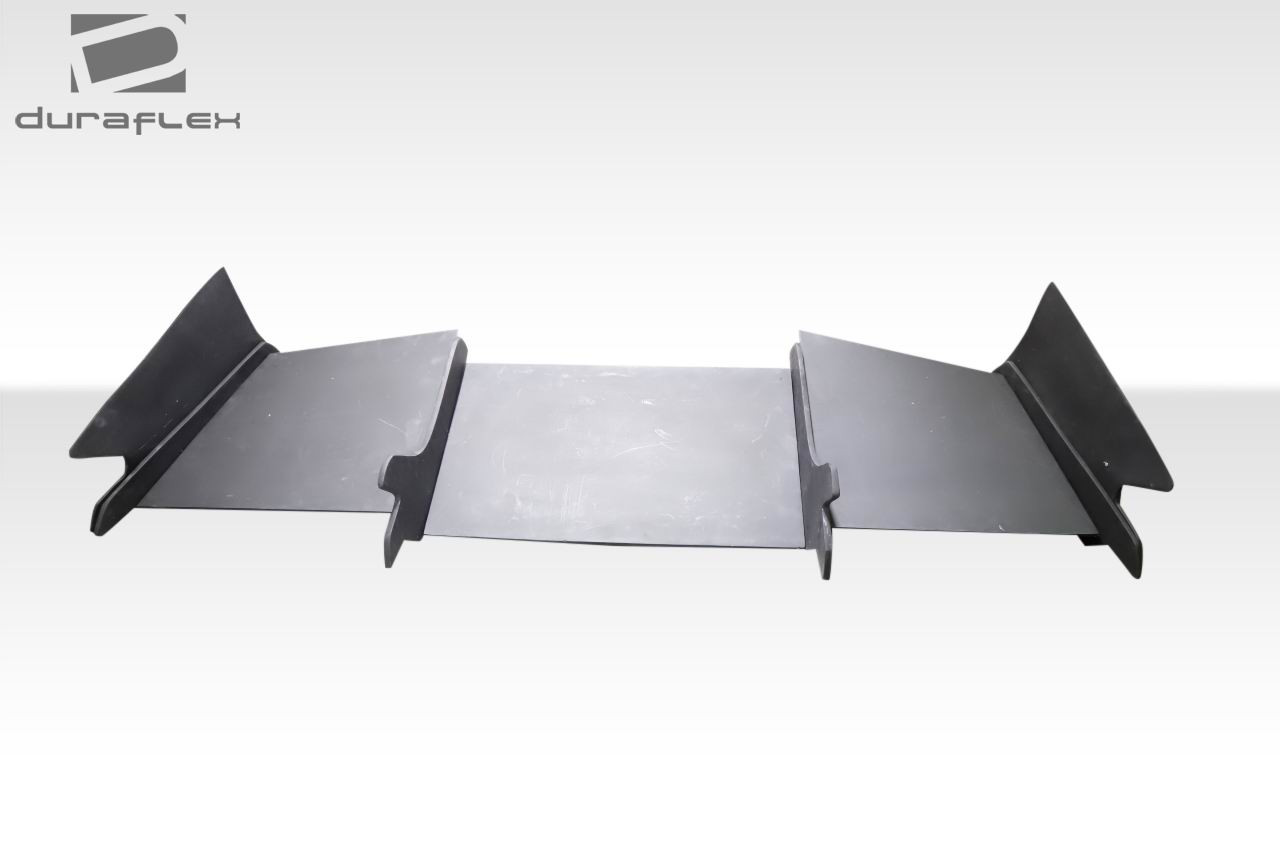 1993-1997 Mazda RX-7 Duraflex TKO Boss Wide Body Rear Diffuser - 9 Piece / Vehicle Year Make Model Trim - 1993-1997-Mazda RX7 ALL / Product Type - Rear Lip/Add On / Style Name -TKO Boss / Kit Material - FRP (Fiberglass Reinforced Plastics) / Notes -
