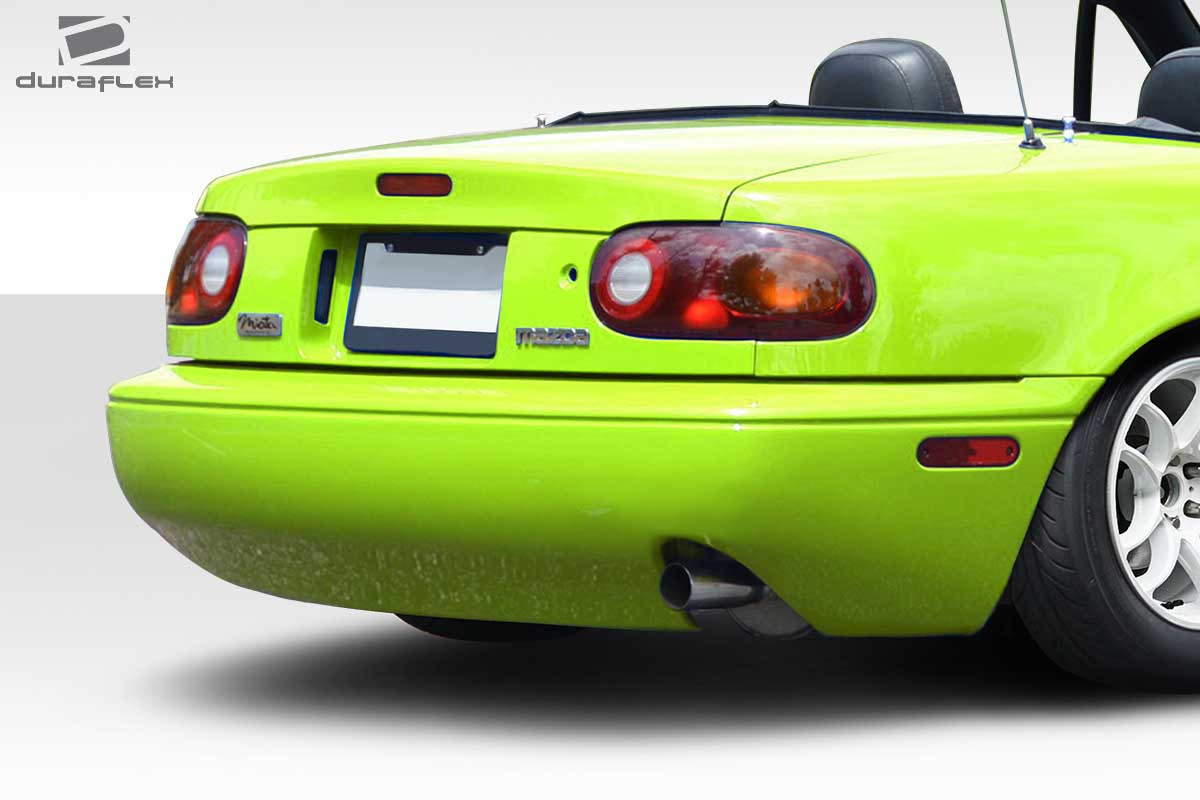 1990-1997 Mazda Miata Duraflex WX-9 Rear Bumper Cover - 1 Piece / Vehicle Year Make Model Trim - 1990-1997-Mazda Miata ALL / Product Type - Rear Bumper / Style Name -WX-9 / Kit Material - FRP (Fiberglass Reinforced Plastics) / Notes -