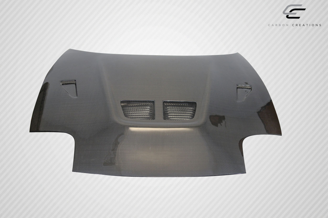 1991-1993 Mitsubishi 3000GT Carbon Creations Evo Hood - 1 Piece / Vehicle Year Make Model Trim - 1991-1993-Mitsubishi 3000GT ALL / Product Type - Hood / Style Name -EVO / Kit Material - Carbon Fiber / Notes - Note: Hood pins are required.