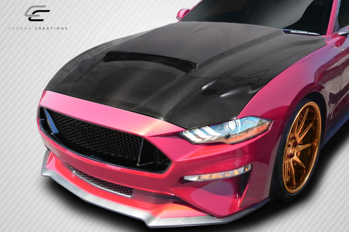 2018-2023 Ford Mustang Carbon Creations CVX Hood - 1 Piece / Vehicle Year Make Model Trim - 2018-2023-Ford Mustang ALL / Product Type - Hood / Style Name -CVX / Kit Material - Carbon Fiber / Notes - Note: Hood pins are required.