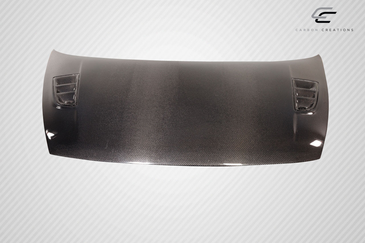 2006-2011 Honda Civic 4DR Carbon Creations Type M Hood - 1 Piece / Vehicle Year Make Model Trim - 2006-2011-Honda Civic 4DR / Product Type - Hood / Style Name -Type M / Kit Material - Carbon Fiber / Notes - Note: Hood pins are required.
