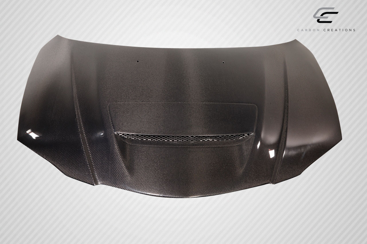 2004-2008 Mazda 3 4DR Carbon Creations M-Speed Hood - 1 Piece / Vehicle Year Make Model Trim - 2004-2008-Mazda Mazda 3 4DR / Product Type - Hood / Style Name -M-Speed / Kit Material - Carbon Fiber / Notes - Note: Hood pins are required.