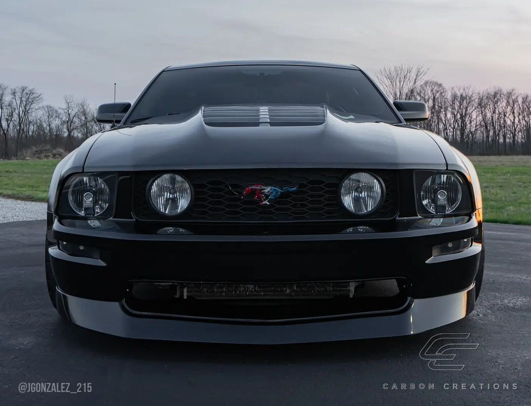 2005-2009 Ford Mustang Carbon Creations GT500 V2 Hood - 1 Piece / Vehicle Year Make Model Trim - 2005-2009-Ford Mustang ALL / Product Type - Hood / Style Name -GT500 V2 / Kit Material - Carbon Fiber / Notes - Note: Hood pins are required.