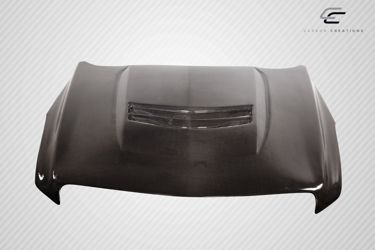 2012-2019 Cadillac ATS Carbon Creations V Look Hood - 1 Piece / Vehicle Year Make Model Trim - 2012-2019-Cadillac ATS ALL / Product Type - Hood / Style Name -V Look / Kit Material - Carbon Fiber / Notes - Note: Hood pins are required.