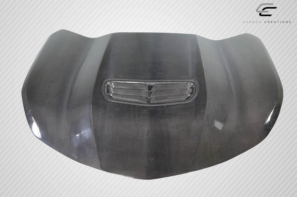 2016-2023 Chevrolet Camaro Carbon Creations SS Look Hood - 1 Piece / Vehicle Year Make Model Trim - 2016-2023-Chevrolet Camaro ALL / Product Type - Hood / Style Name -SS Look / Kit Material - Carbon Fiber / Notes - Note: Hood pins are required. Not designed for ZL1.