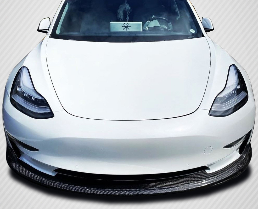 2017-2023 Tesla Model 3 Carbon Creations GT Concept Front Lip - 1 Piece / Vehicle Year Make Model Trim - 2017-2023-Tesla Model 3 ALL / Product Type - Front Lip/Add On / Style Name -GT Concept / Kit Material - Carbon Fiber / Notes -