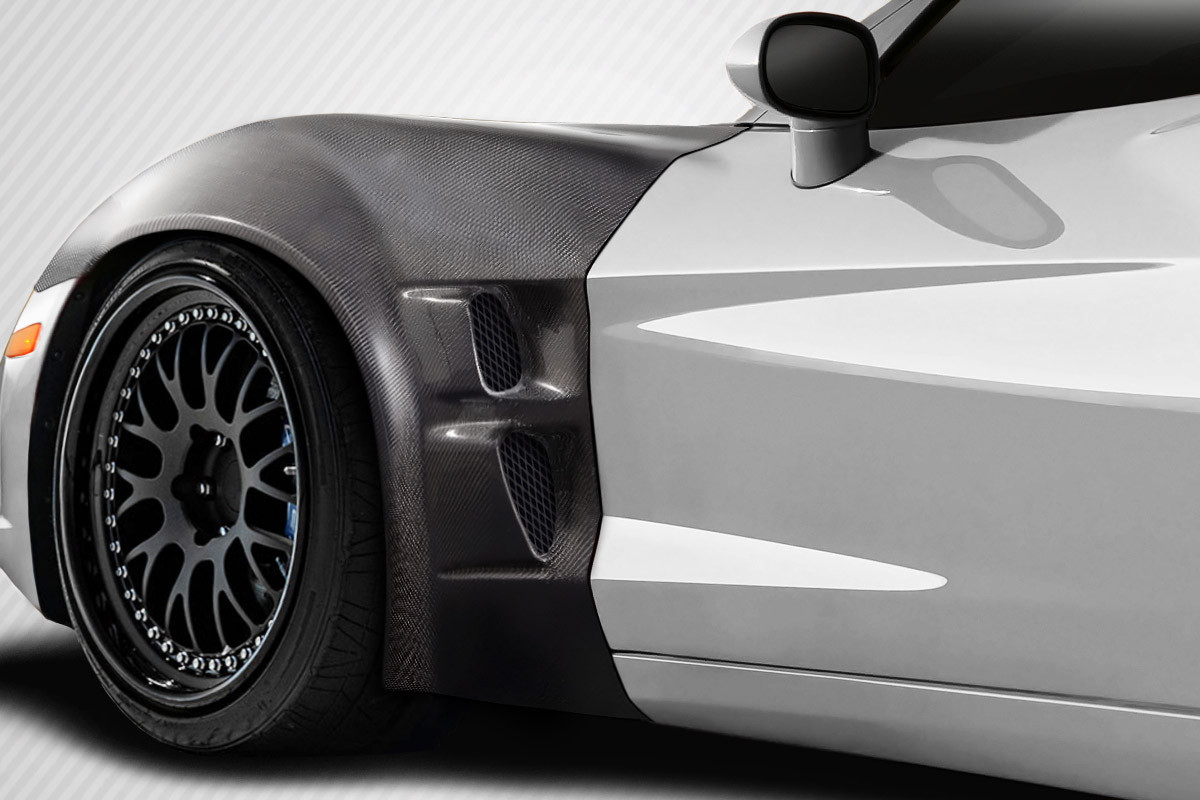 2005-2013 Chevrolet Corvette C6 Carbon Creations ZR2 Front Fenders - 2 Piece / Vehicle Year Make Model Trim - 2005-2013-Chevrolet Corvette ALL / Product Type - Fender / Style Name -ZR2 / Kit Material - Carbon Fiber / Notes - Note: For GS/Z06/ZR1 Models only: Front Fenders Widen stance by 2"