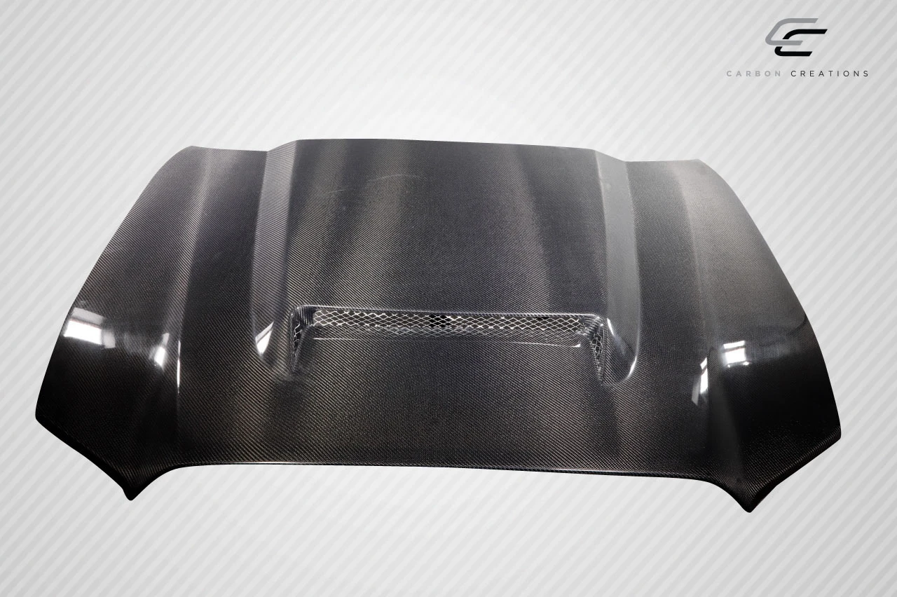 2016-2023 Toyota Tacoma Carbon Creations RKS Hood - 1 Piece / Vehicle Year Make Model Trim - 2016-2023-Toyota Tacoma ALL / Product Type - Hood / Style Name -RKS / Kit Material - Carbon Fiber / Notes - Note: Hood Pins are Required