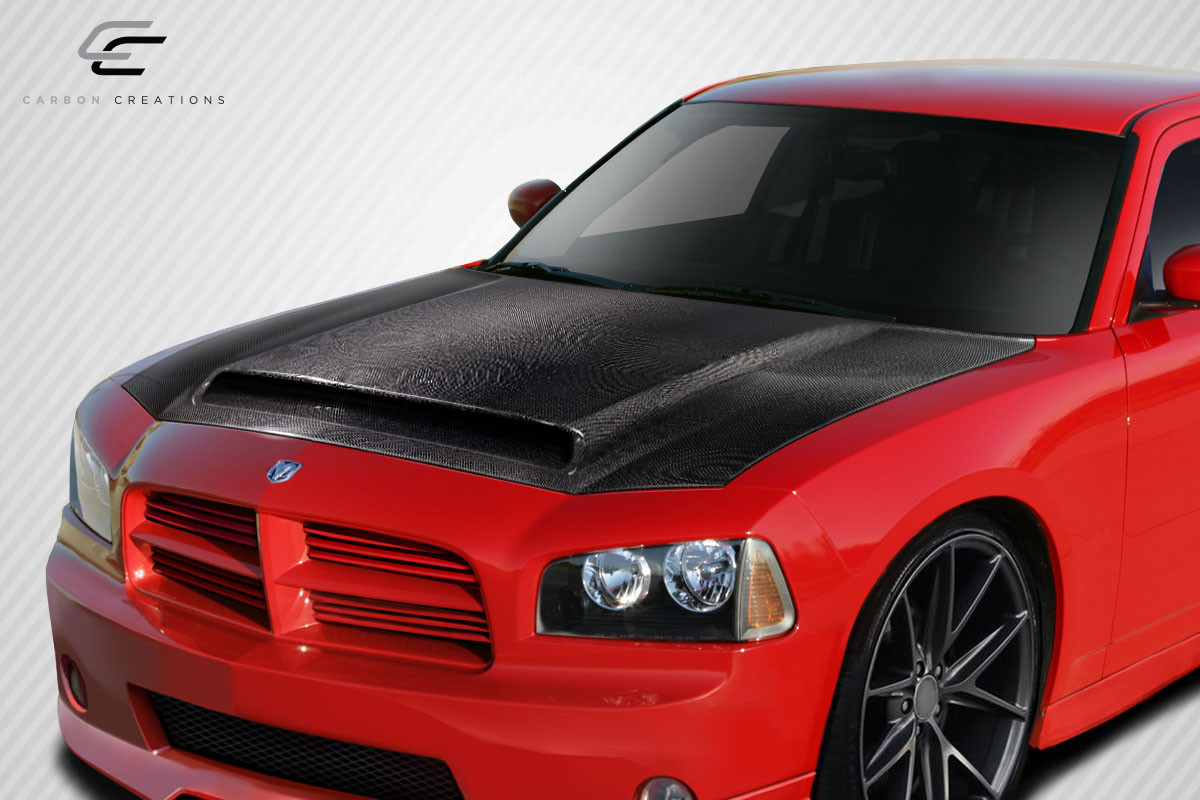 2006-2010 Dodge Charger Carbon Creations Demon Look Hood - 1 Piece / Vehicle Year Make Model Trim - 2006-2010-Dodge Charger ALL / Product Type - Hood / Style Name -Demon Look / Kit Material - Carbon Fiber / Notes - Note: Hood Pins are Required