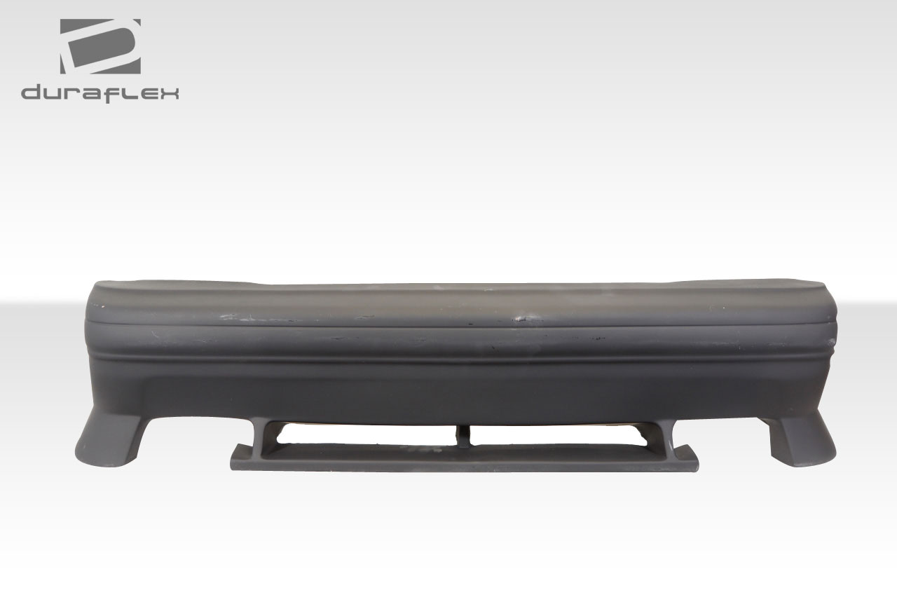 1986-1991 Mazda RX-7 Duraflex Vanish Rear Bumper Cover - 1 Piece / Vehicle Year Make Model Trim - 1986-1991-Mazda RX7 ALL / Product Type - Rear Bumper / Style Name -Vanish / Kit Material - FRP (Fiberglass Reinforced Plastics) / Notes -