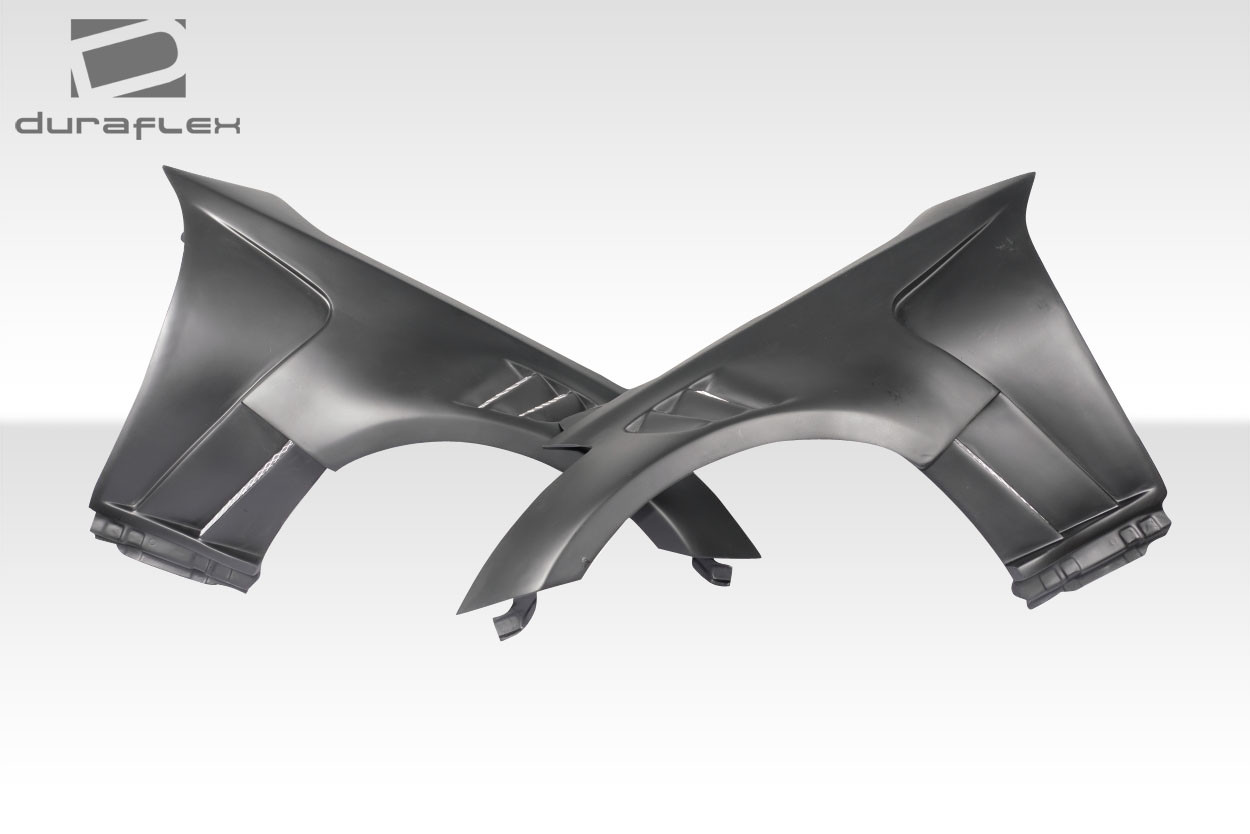 2003-2008 Nissan 350Z Z33 Duraflex AMS GT3 Front Fenders - 2 Piece / Vehicle Year Make Model Trim - 2003-2008-Nissan 350Z ALL / Product Type - Fender / Style Name -AMS GT3 / Kit Material - FRP (Fiberglass Reinforced Plastics) / Notes - Note: Requires trimming of the frame under the top fender louvers