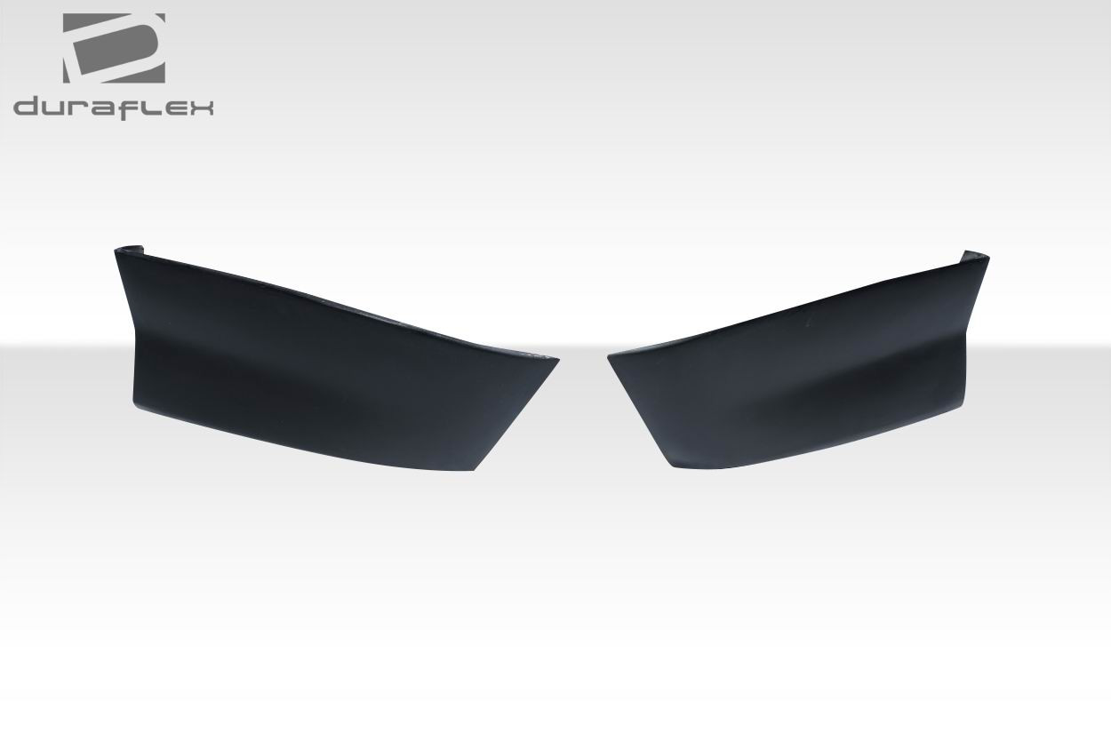 2010-2013 Chevrolet Camaro Duraflex Stream Rear Lip Add Ons - 2 Piece / Vehicle Year Make Model Trim - 2010-2013-Chevrolet Camaro ALL / Product Type - Rear Lip/Add On / Style Name -Stream / Kit Material - FRP (Fiberglass Reinforced Plastics) / Notes -