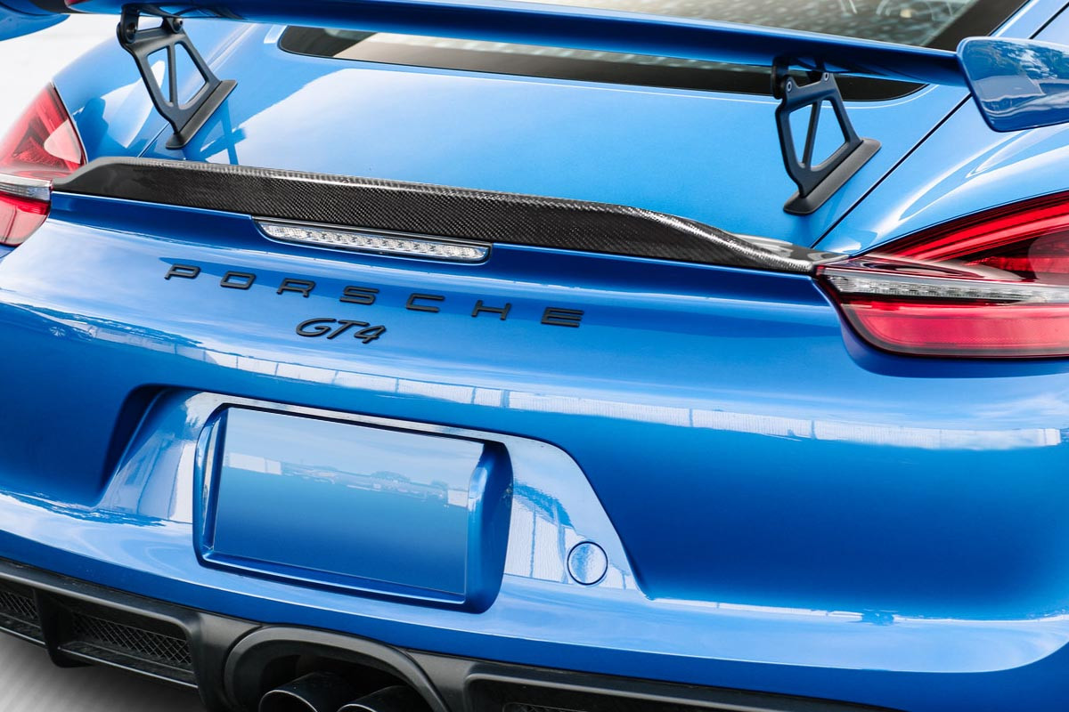 2014-2016 Porsche Cayman Carbon Creations GT4 Look Ducktail Rear Wing Spoiler - 1 Piece / Vehicle Year Make Model Trim - 2014-2016-Porsche Cayman ALL / Product Type - Wing / Style Name -GT4 Ducktail / Kit Material - Carbon Fiber / Notes -