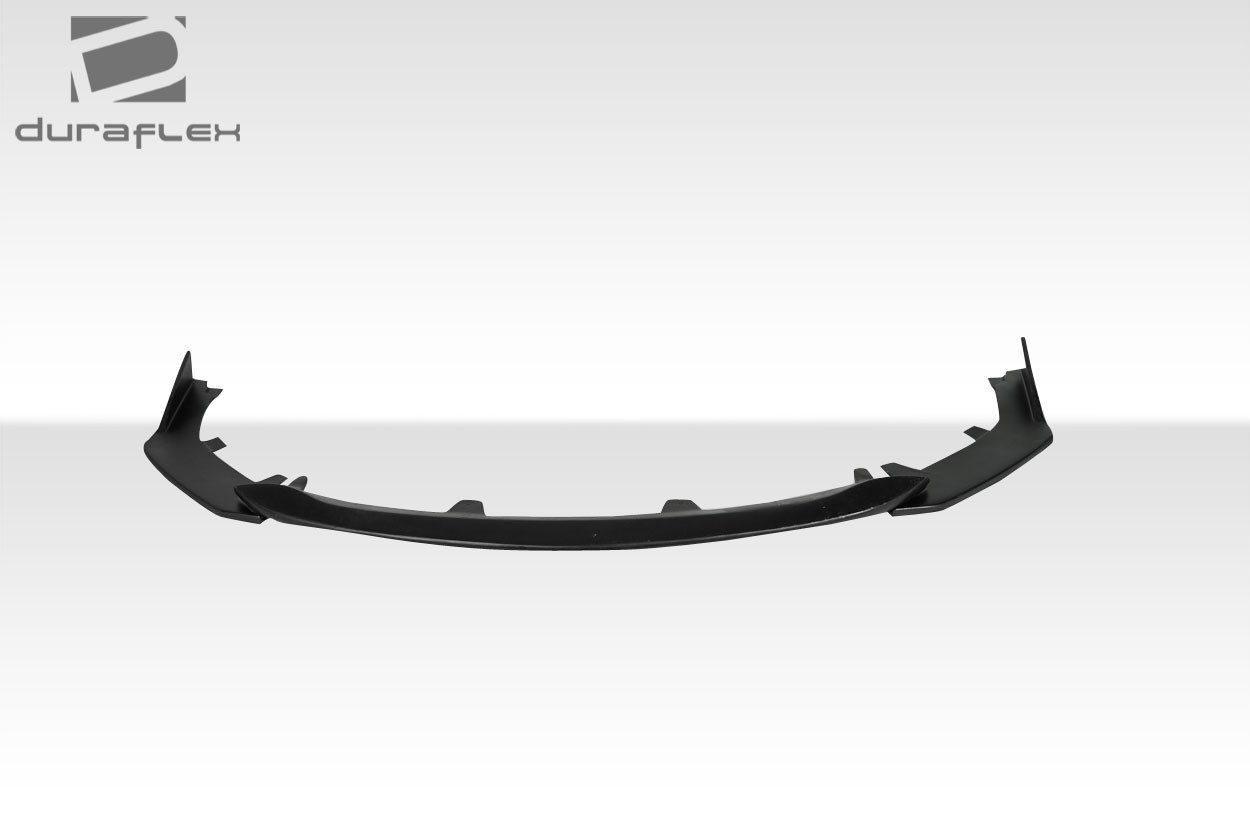 2019-2025 Toyota Corolla Hatchback Duraflex T Spec Front Lip Under Spoiler - 1 Piece / Vehicle Year Make Model Trim - 2019-2025-Toyota Corolla ALL / Product Type - Front Lip/Add On / Style Name -T Spec / Kit Material - FRP (Fiberglass Reinforced Plastics) / Notes -