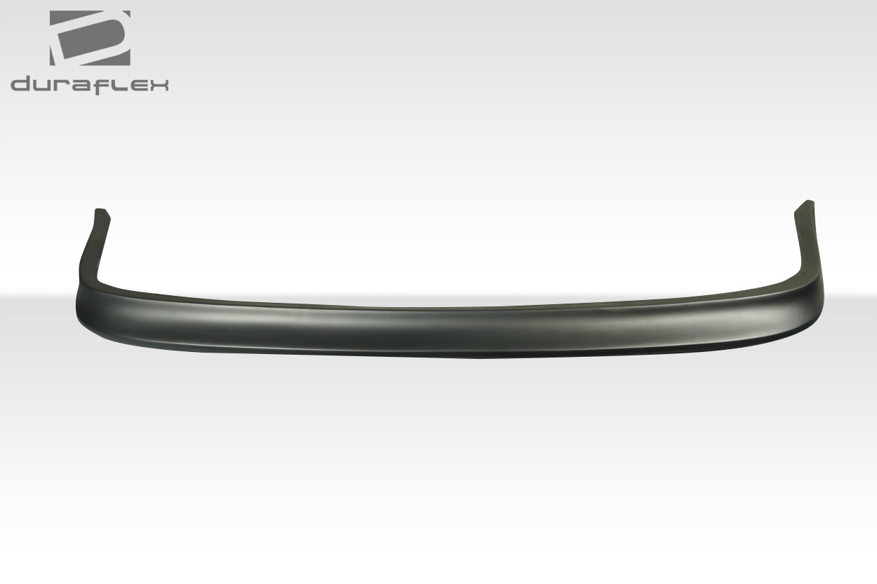 1986-1992 Toyota Supra Duraflex D1 Front Lip Under Spoiler - 1 Piece / Vehicle Year Make Model Trim - 1986-1992-Toyota Supra 2DR / Product Type - Front Lip/Add On / Style Name -D1 / Kit Material - FRP (Fiberglass Reinforced Plastics) / Notes -