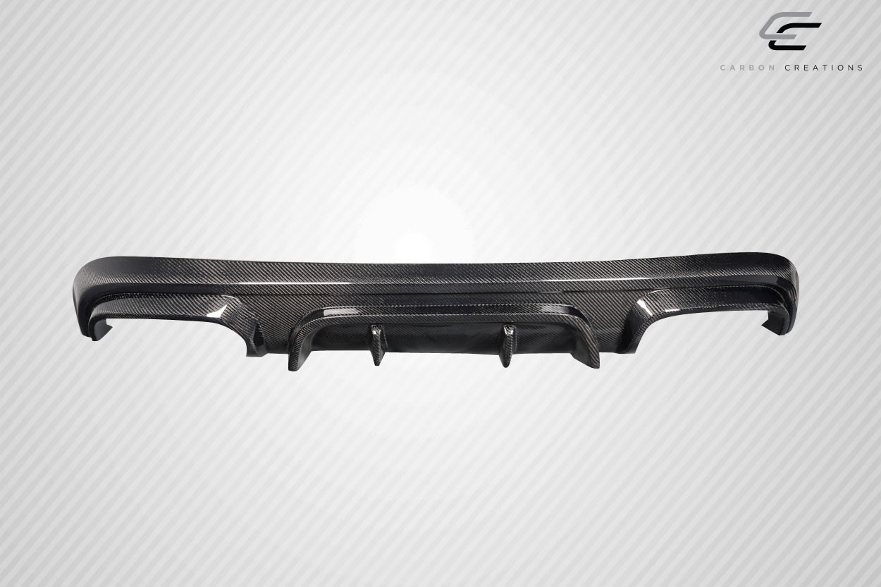 2011-2022 Jeep Grand Cherokee Carbon Creations Gamma Rear Diffuser - 1 Piece / Vehicle Year Make Model Trim - 2011-2022-Jeep Grand Cherokee ALL / Product Type - Rear Lip/Add On / Style Name -Gamma / Kit Material - Carbon Fiber / Notes - NOTE: This item will only fit the 11-22 WK2 Grand Cherokee, please confirm your vehicle with your sale representative before purchasing