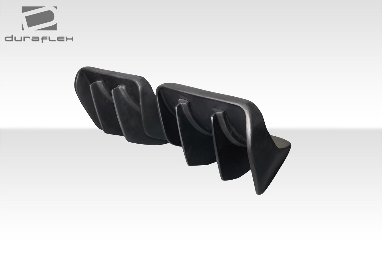 2014-2019 Chevrolet Corvette C7 Duraflex GTR Rear Diffuser - 2 Pieces / Vehicle Year Make Model Trim - 2014-2019-Chevrolet Corvette ALL / Product Type - Rear Lip/Add On / Style Name -GTR / Kit Material - FRP (Fiberglass Reinforced Plastics) / Notes -