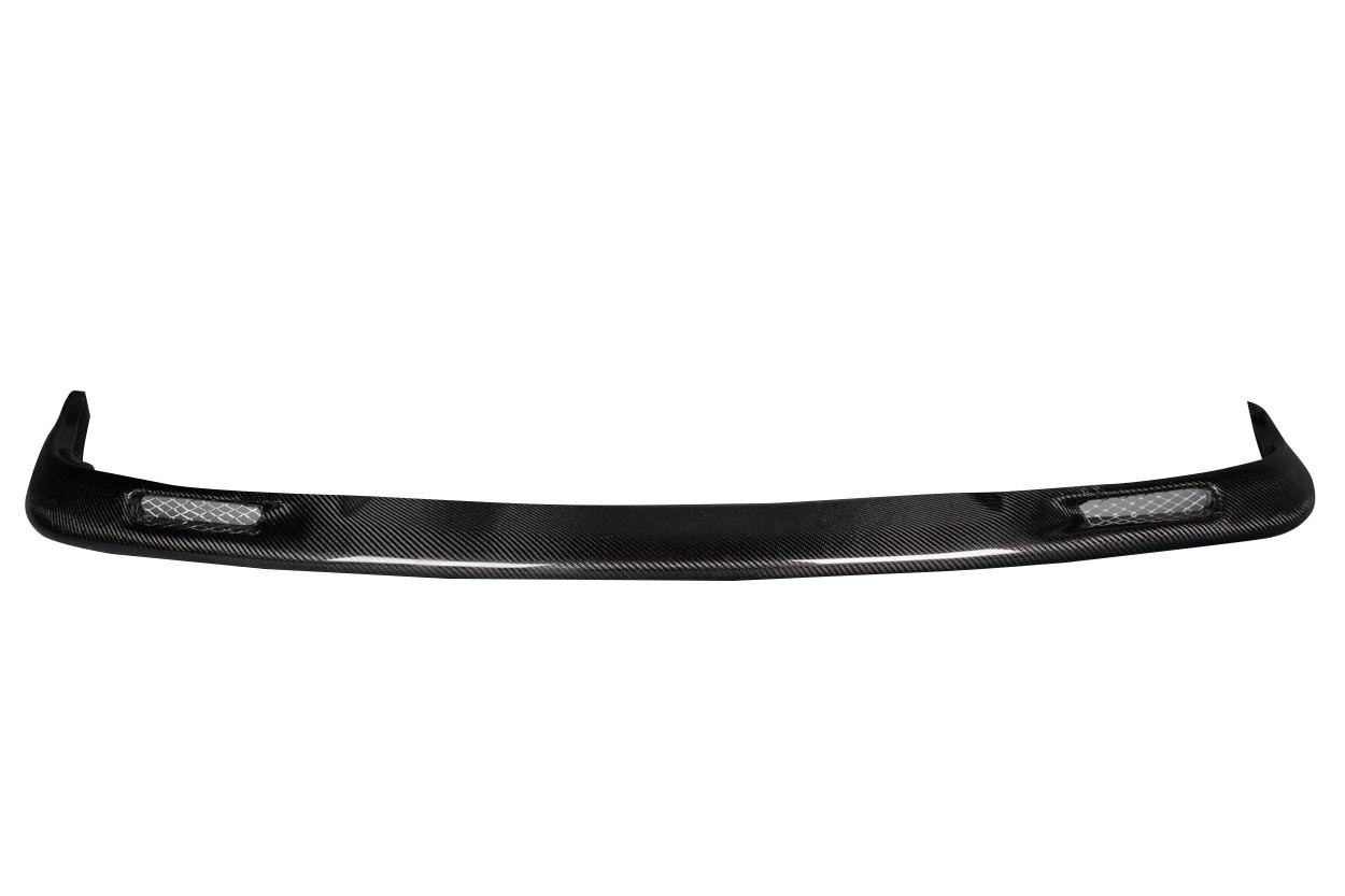 1986-1991 Mazda RX-7 Carbon Creations Apex Front Lip Spoiler Air Dam - 1 Piece / Vehicle Year Make Model Trim - 1986-1991-Mazda RX7 ALL / Product Type - Front Lip/Add On / Style Name -Apex / Kit Material - Carbon Fiber / Notes -