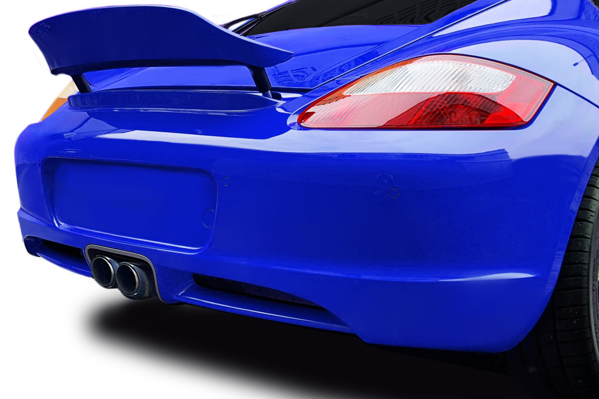 2009-2012 Porsche 987 Cayman Duraflex 997 GT3 RS Look Rear Bumper Cover - 1 Piece / Vehicle Year Make Model Trim - 2009-2012-Porsche Cayman  / Product Type - Rear Bumper / Style Name -GT3 RS Look / Kit Material - FRP (Fiberglass Reinforced Plastics) / Notes -