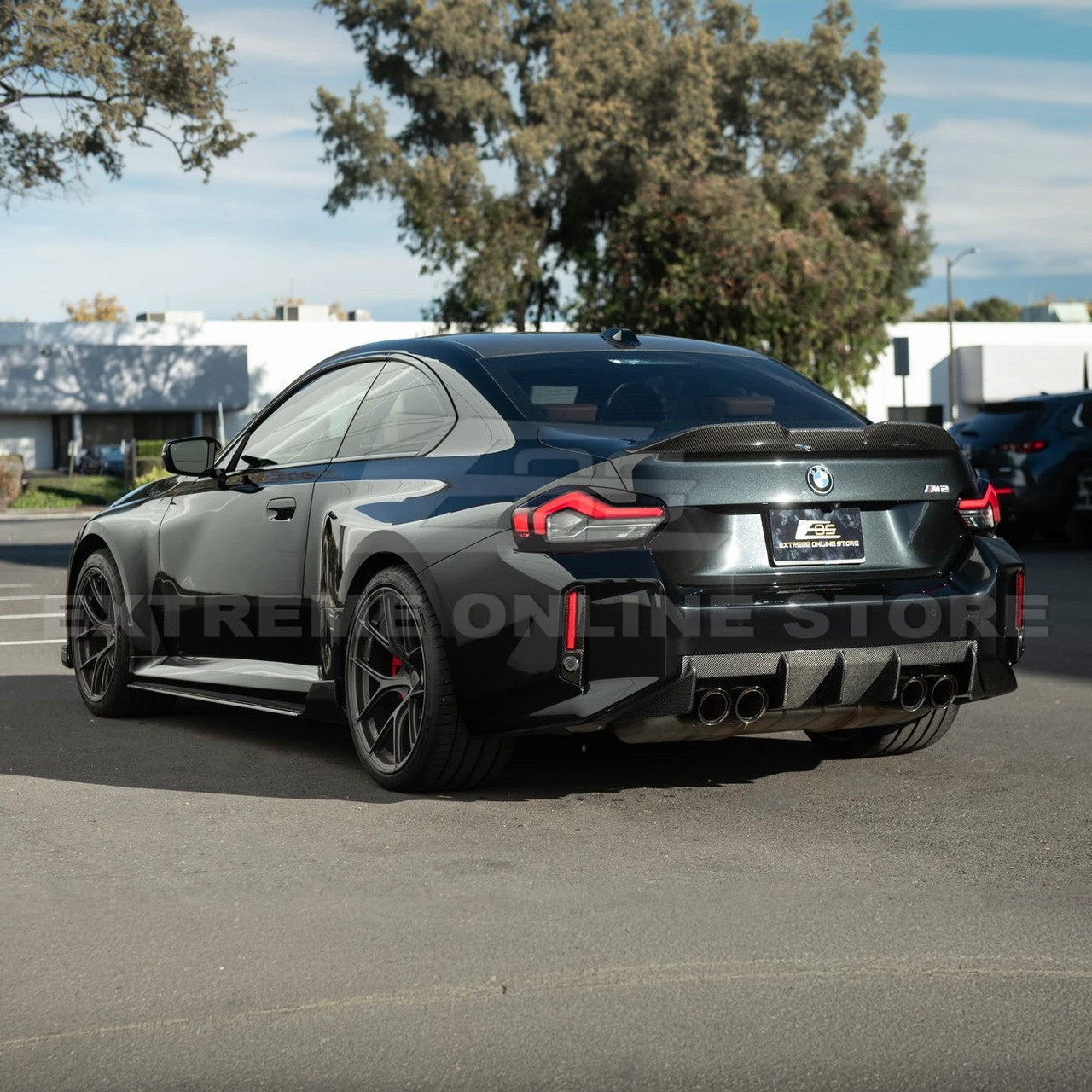 EOS Carbon Fiber Rear Bumper Deflectors - 2023+ BMW M2 G87 (VENT-1429-BKCF)