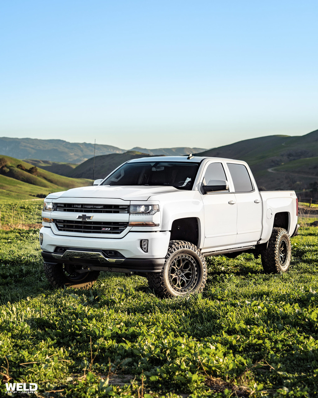 Weld Ledge 6 W134 17x9 / 6x139.7 / +0 Offset / Candy Red w. Satin Black Ring