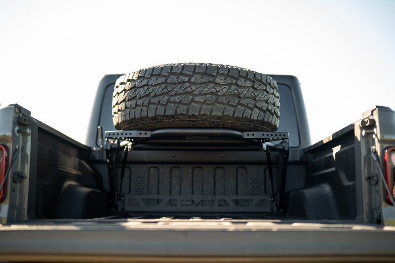 DV8 Offroad 2020+ Jeep Gladiator JT Adjustable In-Bed Tire Carrier - TCGL-03 Photo - out of package
