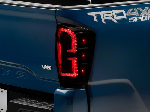Raxiom 16-23 Toyota Tacoma LED Tail Lights- Blk Housing (Smoked Lens) - TT32385