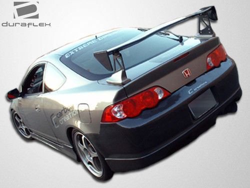 2002-2006 Acura RSX Duraflex Type M Side Skirts Rocker Panels - 2 Piece / Vehicle Year Make Model Trim - 2002-2006-Acura RSX ALL / Product Type - Sideskirts / Style Name -Type M / Kit Material - FRP (Fiberglass Reinforced Plastics) / Notes - Note: carbon creations type m side skirts shown. actual side skirts are made of fiberglass.