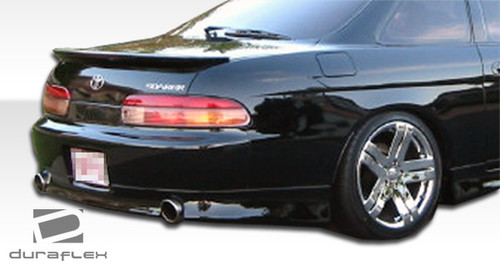 1992-2000 Lexus SC Series SC300 SC400 Duraflex V-Speed Rear Lip Under Spoiler Air Dam - 1 Piece / Vehicle Year Make Model Trim - 1992-2000-Lexus SC ALL / Product Type - Rear Lip/Add On / Style Name -V-Speed / Kit Material - FRP (Fiberglass Reinforced Plastics) / Notes -