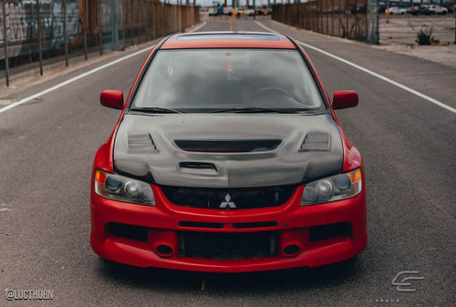 2003-2006 Mitsubishi Lancer Evolution 8 9 Carbon Creations C-1 Hood - 1 Piece / Vehicle Year Make Model Trim - 2003-2006-Mitsubishi Evolution ALL / Product Type - Hood / Style Name -C-1 / Kit Material - Carbon Fiber / Notes - Note: Hood pins are required.