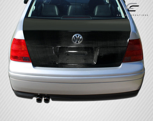 1999-2004 Volkswagen Jetta Carbon Creations OEM Look Trunk - 1 Piece / Vehicle Year Make Model Trim - 1999-2004-Volkswagen Jetta 4DR / Product Type - Trunk/Hatch / Style Name -OEM Look / Kit Material - Carbon Fiber / Notes -