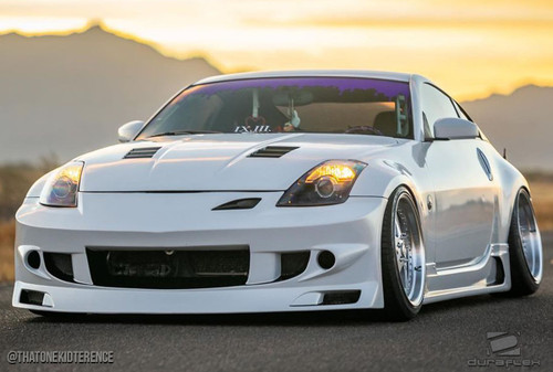 2003-2008 Nissan 350Z Z33 Duraflex J-Spec Body Kit - 4 Piece - Includes J-Spec Front Bumper Cover (107829) J-Spec Side Skirts Rocker Panels (107830) J-Spec Rear Lip Under Spoiler Air Dam (107831) / Vehicle Year Make Model Trim - 2003-2008-Nissan 350Z 2DR / Product Type - Kit / Style Name -J-Spec / Kit Material - FRP (Fiberglass Reinforced Plastics) / Notes -