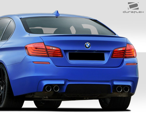 2011-2016 BMW 5 Series F10 Duraflex M5 Look Rear Bumper Cover - 1 Piece / Vehicle Year Make Model Trim - 2011-2016-BMW 5 Series ALL / Product Type - Rear Bumper / Style Name -M5 Look / Kit Material - FRP (Fiberglass Reinforced Plastics) / Notes -