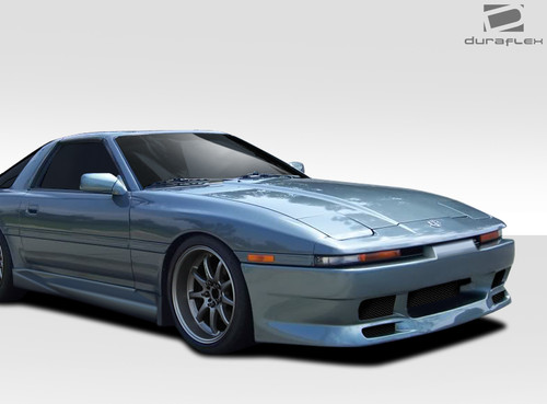 1986-1992 Toyota Supra Duraflex Type G Front Bumper Cover - 1 Piece / Vehicle Year Make Model Trim - 1986-1992-Toyota Supra ALL / Product Type - Front Bumper / Style Name -Type G / Kit Material - FRP (Fiberglass Reinforced Plastics) / Notes -