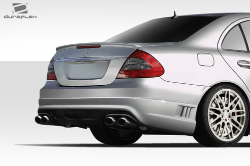 2003-2009 Mercedes E Class W211 4DR Duraflex W-1 Rear Bumper Cover - 1 Piece / Vehicle Year Make Model Trim - 2003-2009-Mercedes E Class 4DR / Product Type - Rear Bumper / Style Name -W-1 / Kit Material - FRP (Fiberglass Reinforced Plastics) / Notes -