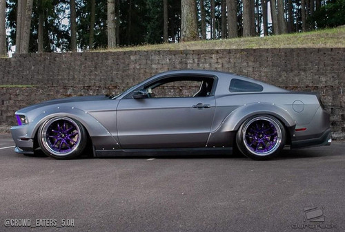 2010-2014 Ford Mustang Duraflex Circuit Wide Body Kit - 4 Piece - Includes Circuit 75 MM Front Fender Flares (112623) Circuit 75 MM Rear Fender Flares (112624) / Vehicle Year Make Model Trim - 2010-2014-Ford Mustang 2DR / Product Type - Kit / Style Name -Circuit / Kit Material - FRP (Fiberglass Reinforced Plastics) / Notes -