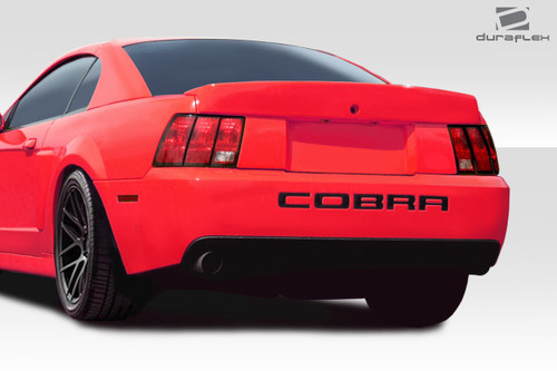 1999-2004 Ford Mustang Duraflex Cobra Look Wing - 1 Piece / Vehicle Year Make Model Trim - 1999-2004-Ford Mustang ALL / Product Type - Wing / Style Name -Cobra Look / Kit Material - FRP (Fiberglass Reinforced Plastics) / Notes -