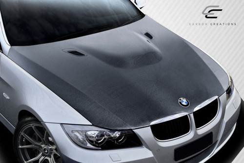 2006-2008 BMW 3 Series E90 4DR Carbon Creations DriTech M3 Look Hood - 1 Piece / Vehicle Year Make Model Trim - 2006-2008-BMW 3 Series 4DR / Product Type - Hood / Style Name -M3 Look / Kit Material - Carbon Fiber / Notes - Note: Hood pins are required.